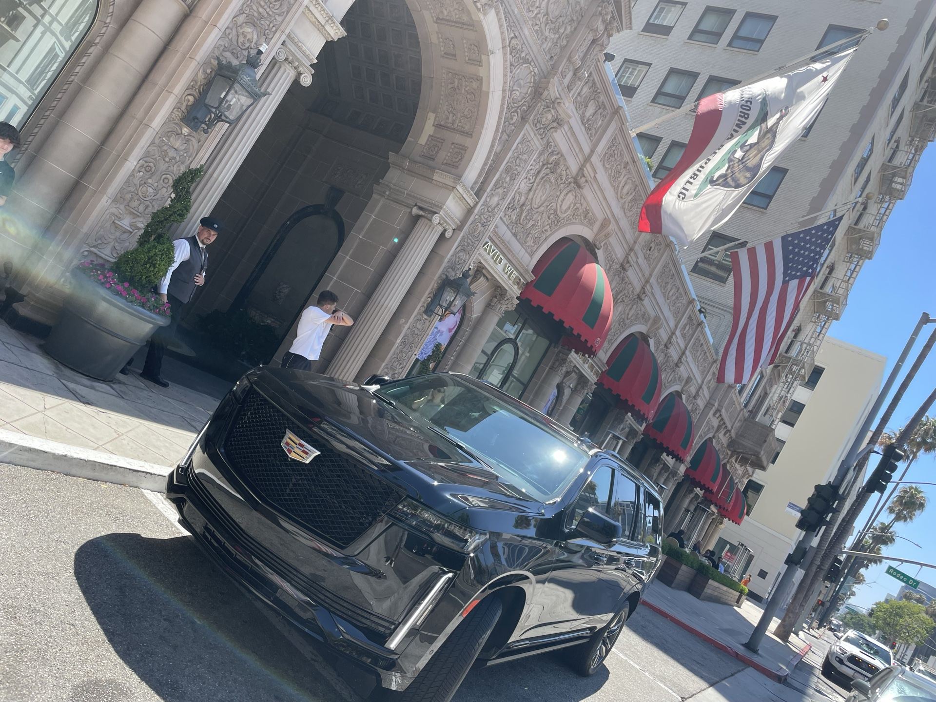 Continental Cadillac Escalade on Wilshire Boulevard, Beverly Hills — Studio City car service, Los Angeles