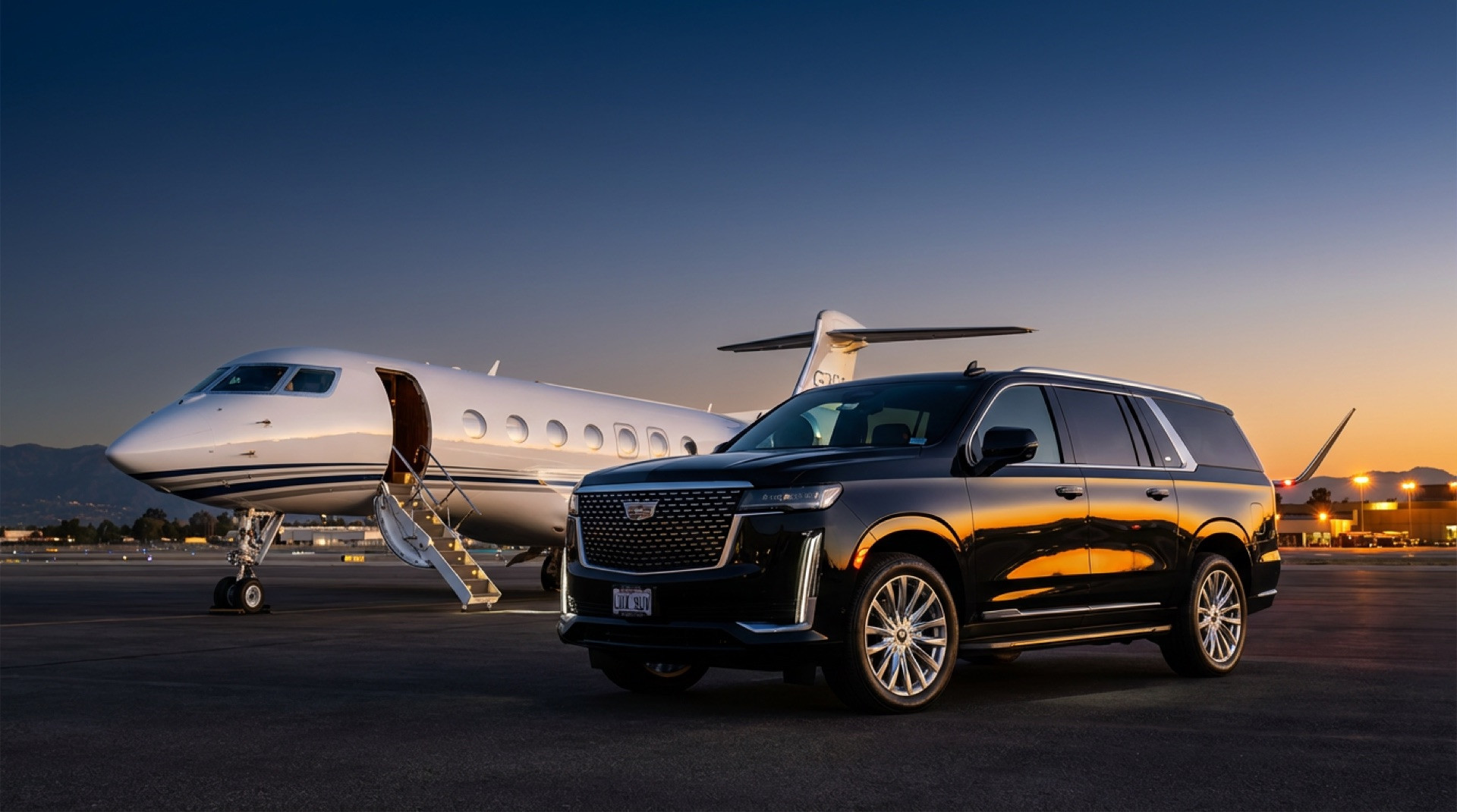 Continental Cadillac Escalade ESV waiting beside a private jet on the tarmac at Van Nuys Airport