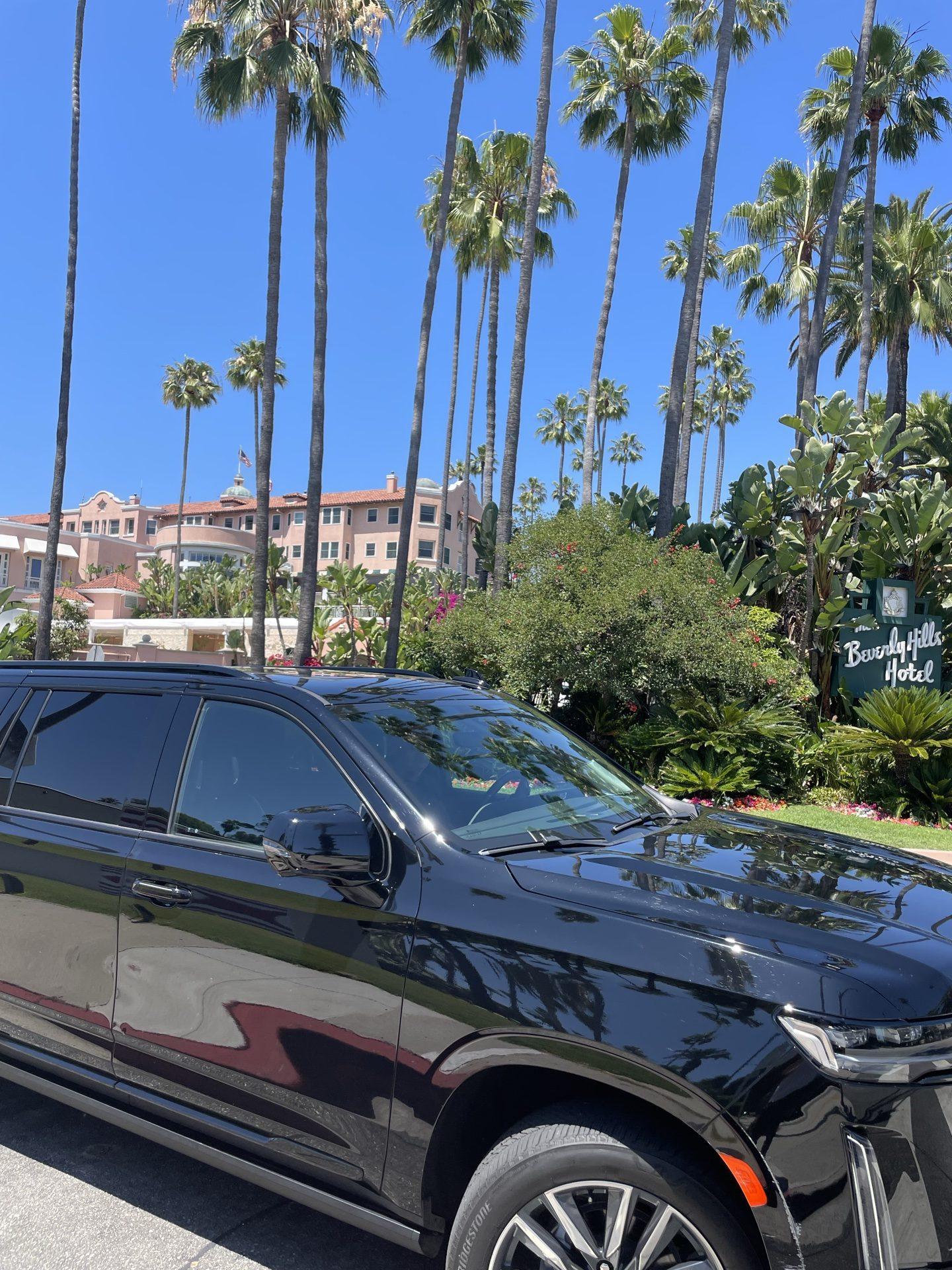 Continental Cadillac Escalade ESV near the Beverly Hills Hotel. hourly chauffeur service