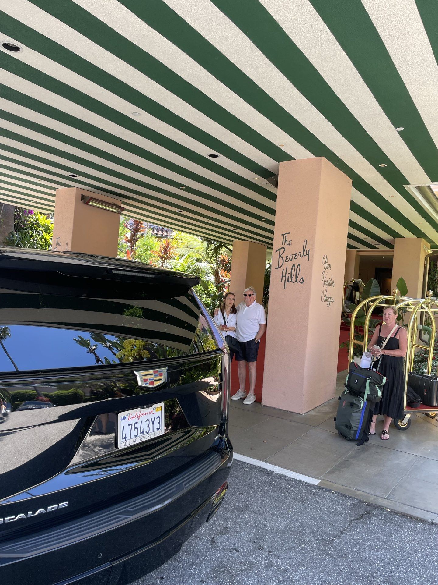 Continental Cadillac Escalade greeting guests at a hotel entrance — Malibu car service, Los Angeles